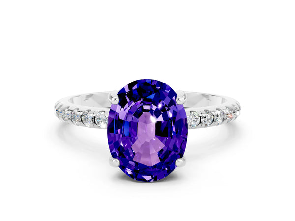 White gold Oval Cut Tanzanite Hidden Halo Engagement Ring with Round Pavé Band and Prong Setting