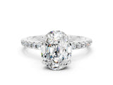 White gold Oval Cut Diamond Solitaire Ring with Four-Prong Setting and Pavé Band