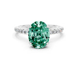 White gold Oval Cut Diamond Solitaire Ring with Four-Prong Setting and Pavé Band