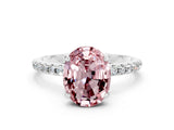 White gold Oval Cut Diamond Solitaire Ring with Four-Prong Setting and Pavé Band