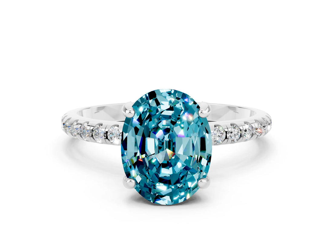White gold Oval Cut Diamond Solitaire Ring with Four-Prong Setting and Pavé Band