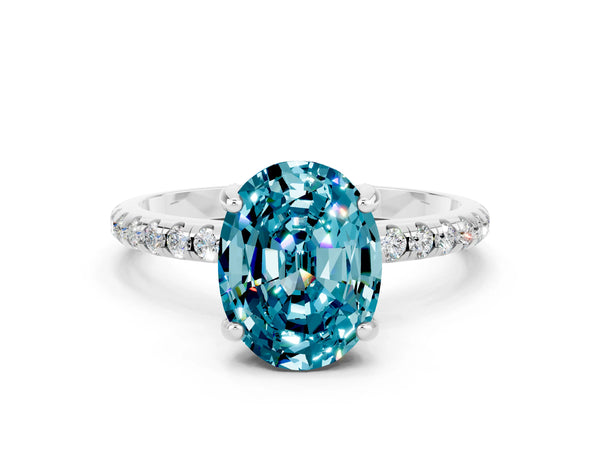Silver Oval Cut Diamond Solitaire Ring with Four-Prong Setting and Pavé Band