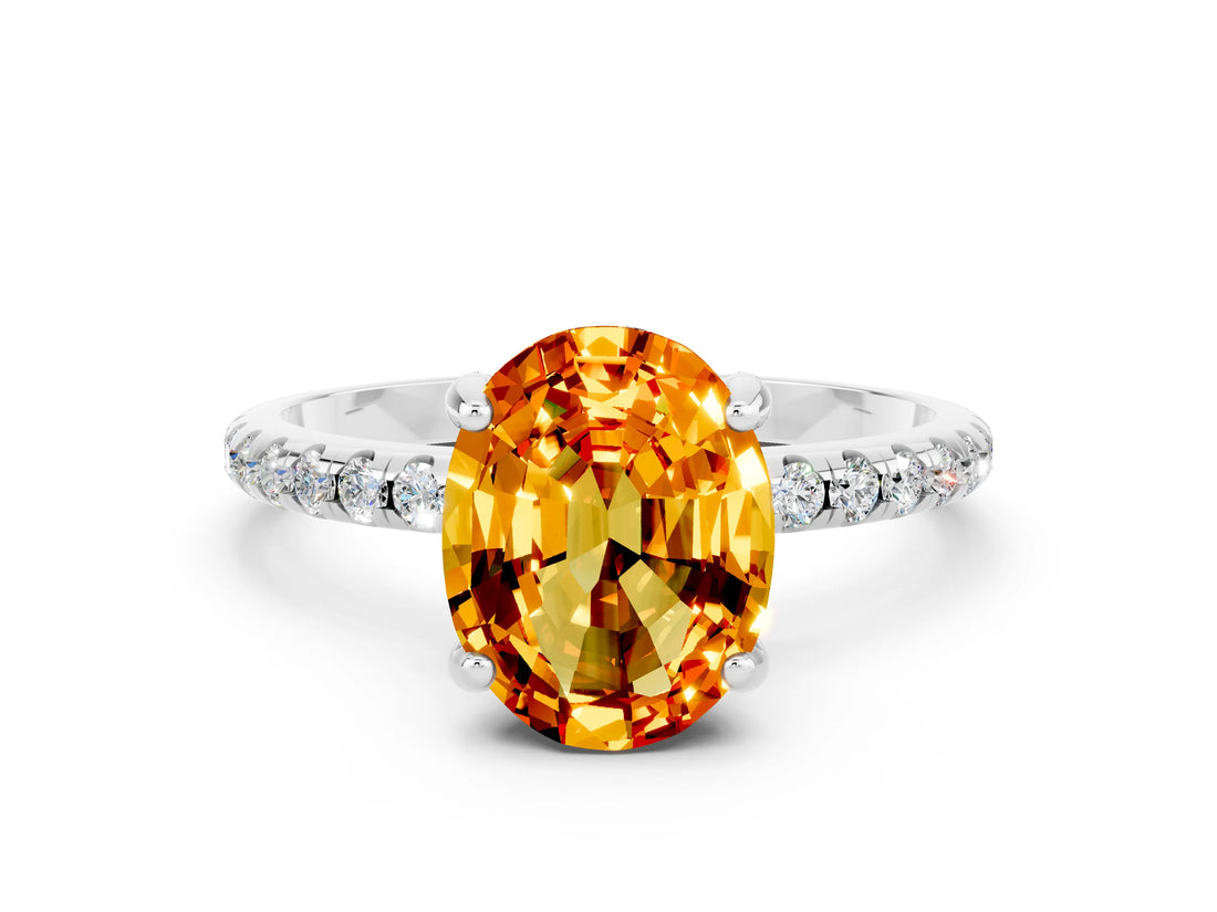 White gold Oval Cut Diamond Solitaire Ring with Four-Prong Setting and Pavé Band