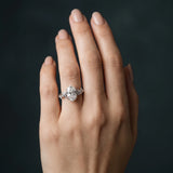 White gold Oval Cut Diamond Solitaire Ring with Leaf Motif Band and Four-Prong Setting_81