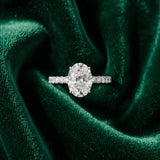 White gold Oval Cut Diamond Solitaire Ring with Pavé Accents and Four-Prong Setting_72