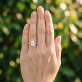 White gold Oval Cut Diamond Solitaire Ring with Pavé Band and Four-Prong Setting_373