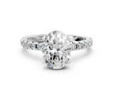 White gold Oval Cut Diamond Solitaire Ring with Pavé Band and Four-Prong Setting_376