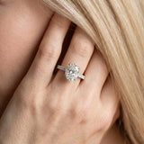 White gold Oval Cut Diamond Solitaire Ring with Pavé Band and Four-Prong Setting_395