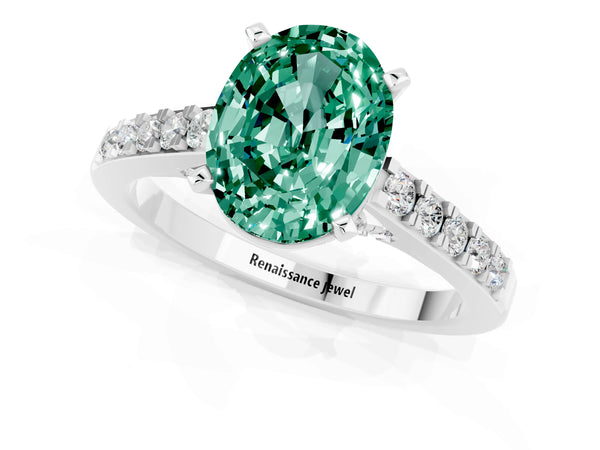 White gold Oval Cut Green Sapphire Solitaire Ring with Crossover Gallery and Round  Pavé Band