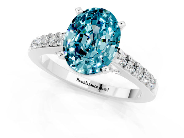 Silver Oval Cut Blue Topaz Solitaire Ring with Crossover Gallery and Round  Pavé Band