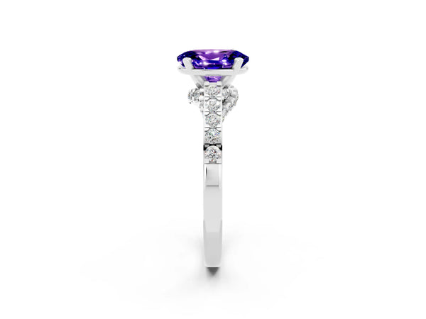 Platinum Oval Cut Tanzanite Solitaire Ring with Crossover Gallery and Round  Pavé Band