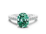 White gold Oval Cut Diamond Solitaire Ring with Pavé Band and Prong Setting