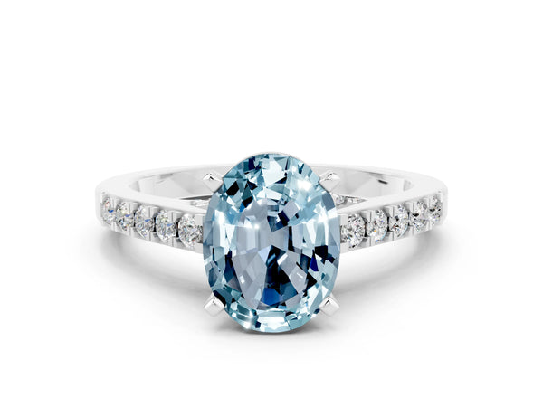 Platinum Oval Cut Aquamarine Solitaire Ring with Crossover Gallery and Round  Pavé Band