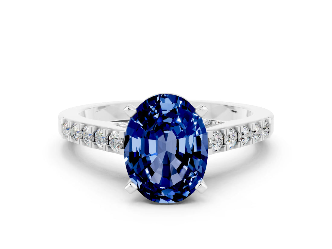 White gold Oval Cut Diamond Solitaire Ring with Pavé Band and Prong Setting