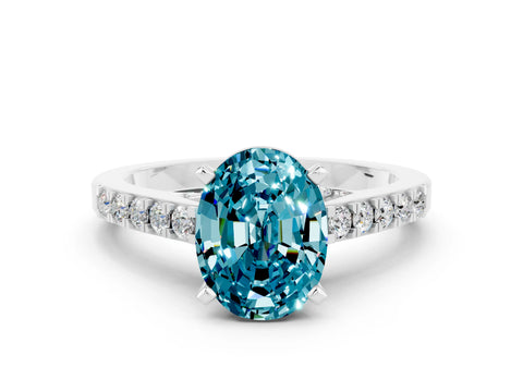 White gold Oval Cut Diamond Solitaire Ring with Pavé Band and Prong Setting