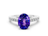 White gold Oval Cut Diamond Solitaire Ring with Pavé Band and Prong Setting
