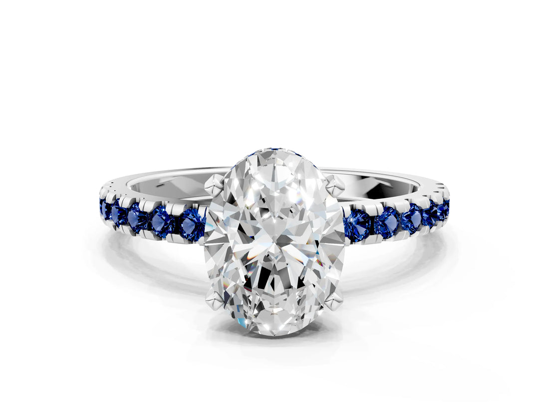 White gold Oval Cut Diamond Solitaire Ring with Round with Blue Sapphire side stone Pavé Band and Four-Prong Setting_12