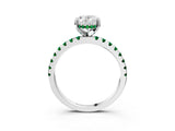 White gold Oval Cut Diamond Solitaire Ring with Round with Emerald side stone Pavé Band and Four-Prong Setting_3