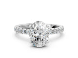 White gold Oval Cut Diamond Solitaire Ring with Round with Moissanite side stone Pavé Band and Four-Prong Setting_36