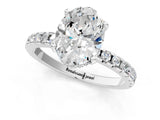 White gold Oval Cut Diamond Solitaire Ring with Round with Moissanite side stone Pavé Band and Four-Prong Setting_37