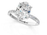 White gold Oval Cut Diamond Solitaire Ring with Round with Moissanite side stone Pavé Band and Prong Setting_1