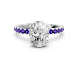 White gold Oval Cut Diamond Solitaire Ring with Round with Tanzanite side stone Pavé Band and Four-Prong Setting