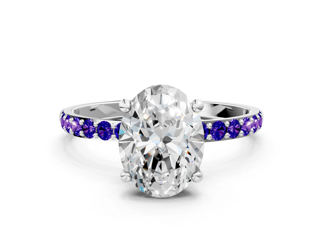 White gold Oval Cut Diamond Solitaire Ring with Round with Tanzanite side stone Pavé Band and Prong Setting