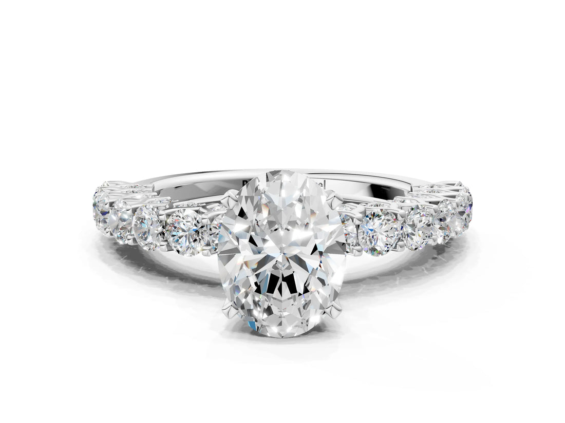 White gold Oval Cut Diamond Solitaire Ring with Shared Prong Pavé Band and Four-Prong Setting_124