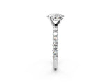 White gold Oval Cut Diamond Solitaire Ring with Shared Prong Pavé Band and Four-Prong Setting_126