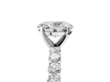 White gold Oval Cut Diamond Solitaire Ring with Shared Prong Pavé Band and Four-Prong Setting_129