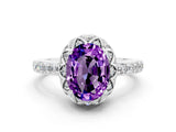 White gold Oval Cut Diamond Solitaire Ring with Shared Prong Pavé Band