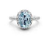 White gold Oval Cut Diamond Solitaire Ring with Shared Prong Pavé Band