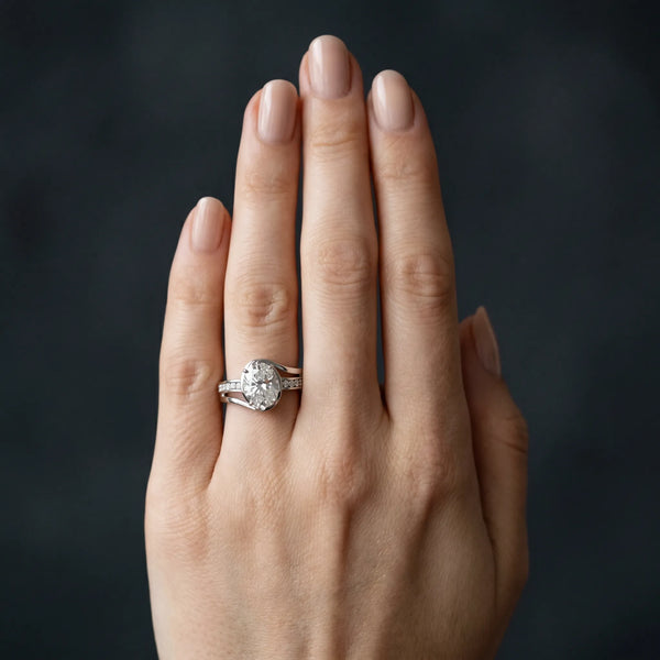 White gold Oval Cut Diamond Solitaire Ring with Split Shank and Prong Setting