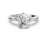 White gold Oval Cut Diamond Solitaire Ring with Tapered Baguette Accents and Four-Prong Setting_89