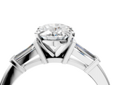 White gold Oval Cut Diamond Solitaire Ring with Tapered Baguette Accents and Four-Prong Setting_93