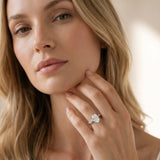 White gold Oval Cut Diamond Solitaire Ring with Twisted Band and Pavé Accents_52