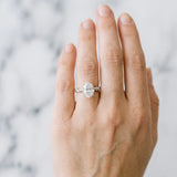 White gold Oval Cut Diamond Solitaire Ring with Twisted Band and Pavé Accents_52