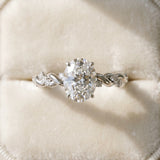 White gold Oval Cut Diamond Solitaire Ring with Twisted Band and Pavé Accents_54