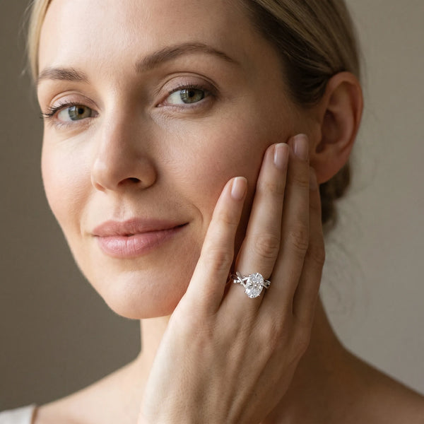 White gold Oval Cut Diamond Solitaire Ring with Twisted Band and Prong Setting