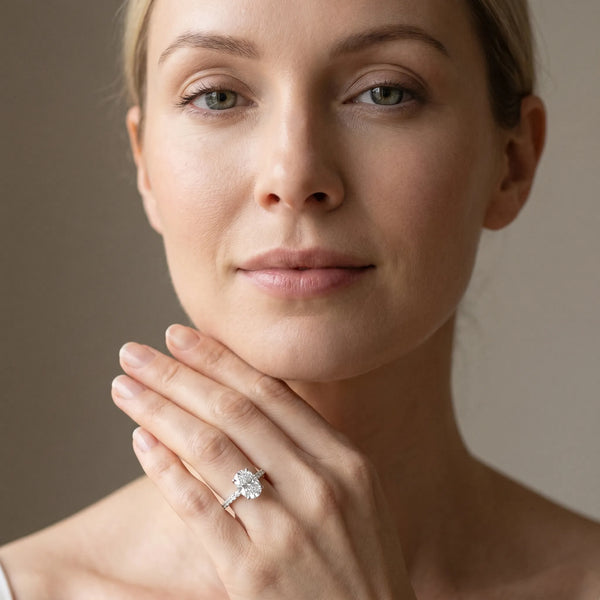 White gold Oval Cut Diamond Solitaire Ring with U-Prong Diamond Band and Four Prong Setting