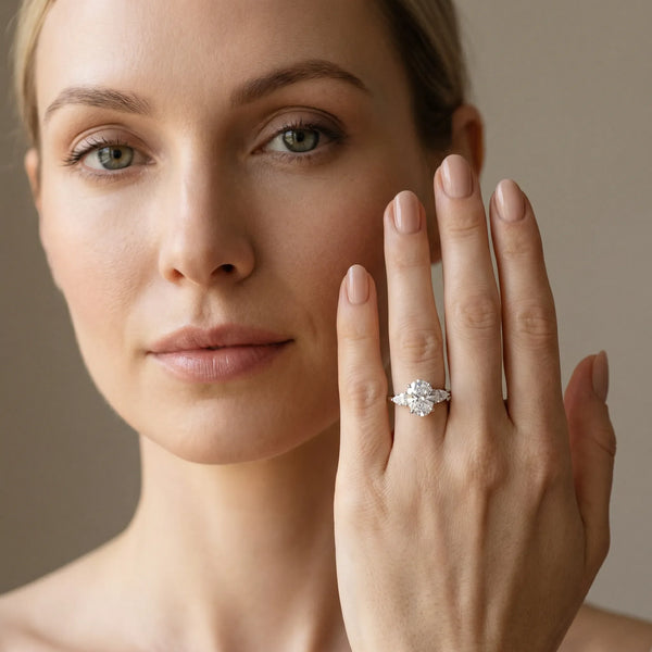 14K White Gold 3.09 Carat D VVS2 Oval Diamond Three-Stone Ring with Pear Side Stones and Prong Setting