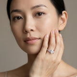 White gold Oval Cut Diamond Three-Stone Ring with Round Side Stones and Pavé Band_123
