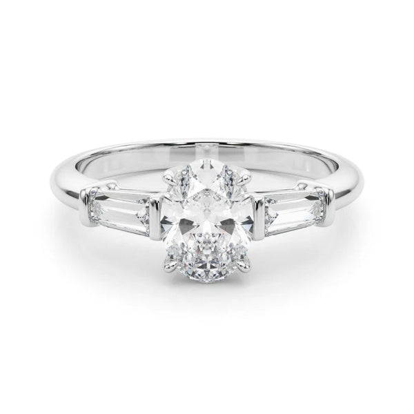 White gold Oval Cut Diamond Three-Stone Ring with Tapered Baguette Side Stones and Prong Setting