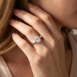 White gold Oval Cut Diamond Three-Stone Ring with Tapered Baguette Side Stones and Prong Setting_29
