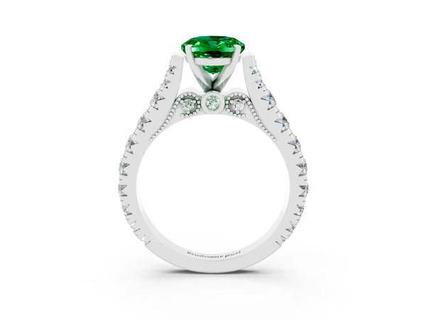 Platinum Oval Cut Emerald Classic Solitaire Ring with Pavé Band and Four-Prong Setting