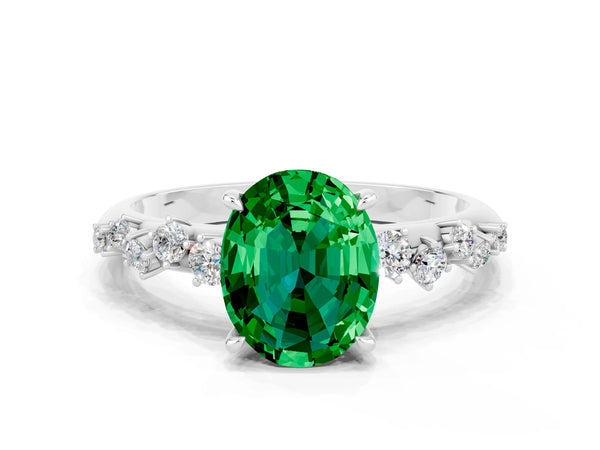 Silver Oval Cut Emerald Cluster Side Stone Solitaire Ring with Prong Setting