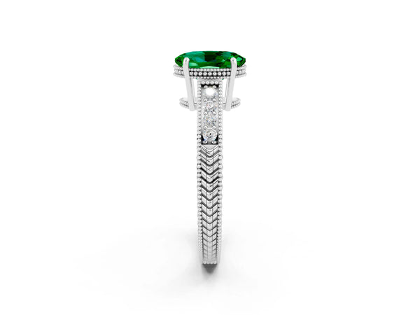 White gold Oval Cut Emerald Engagement Ring with Milgrain Channel Set Band and Prong Setting