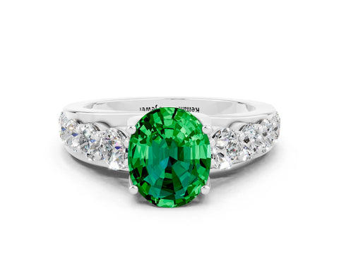 White gold Oval Cut Emerald Engagement Ring with Pavé Band and Four-Prong Setting