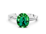 White gold Oval Cut Emerald Engagement Ring with Side Stone Accents and Four-Prong Setting_36