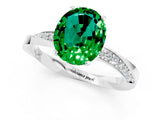 White gold Oval Cut Emerald Engagement Ring with Side Stone Accents and Four-Prong Setting_37